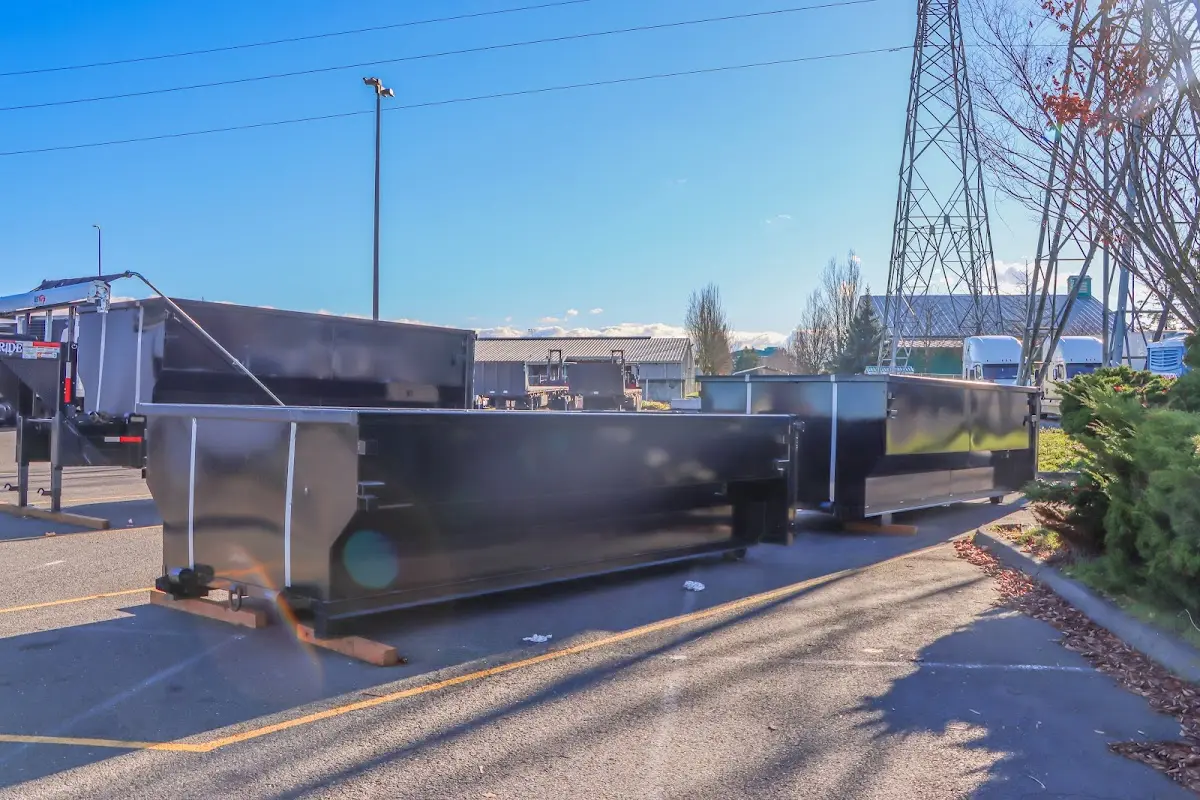 Roll-off dumpster ready for waste disposal at job site for 2 Yard Dumpster Rental in Alliance